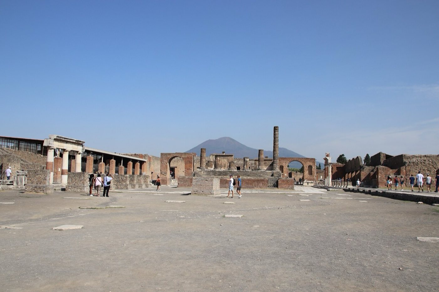 Ruins of the Pompeii forum with Mount Vesuvius rising behind