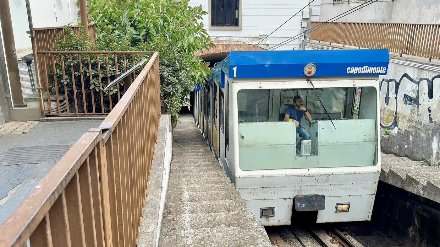 A Naples funicular car climbing the hillside track